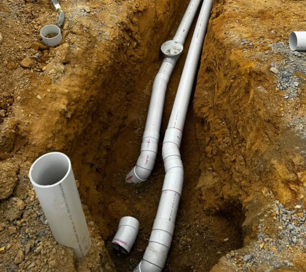 Drain Layer Kapiti drain layer connecting rural drainage pipes.